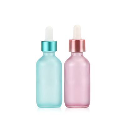 半透明で青いピンクのガラス点滴器の空の精油のびん30ml