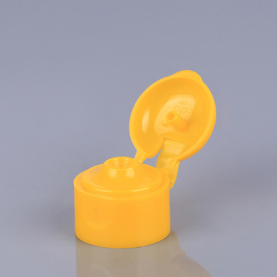 24mmの化粧品のビンの王冠は上のプラスチック分配の帽子を弾く
